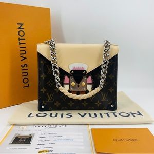 Louis Vuitton limited Tribal Mask Pochette Monogram Canvas GM
